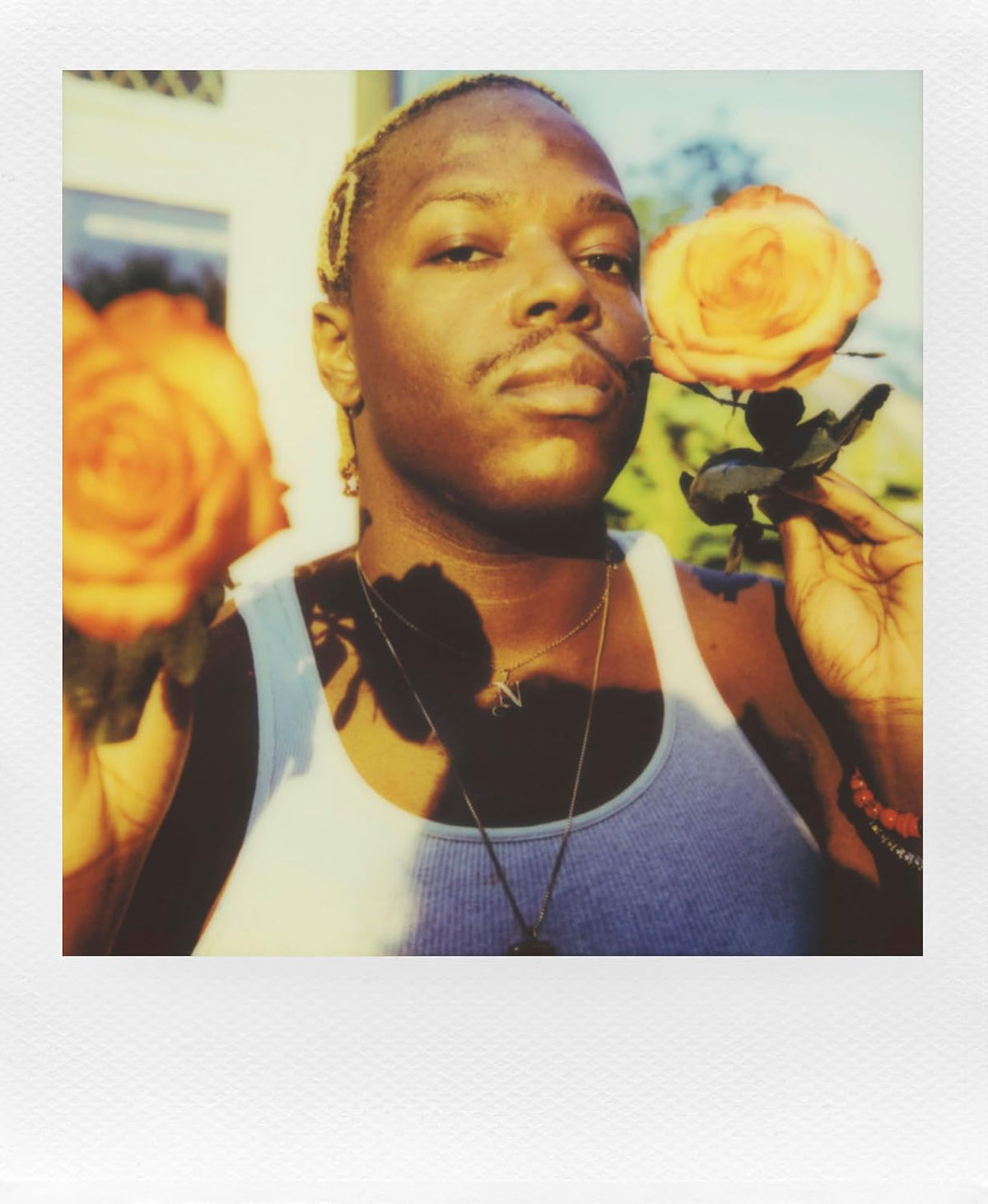 Appareil photo instantané Polaroid Flip + film couleur (16 photos incluses) - Noir (6565) - Système hyperfocal à 4 objectifs, autofocus sonar et analyse de la lumière avec application compagnon Bluetooth – Présentation