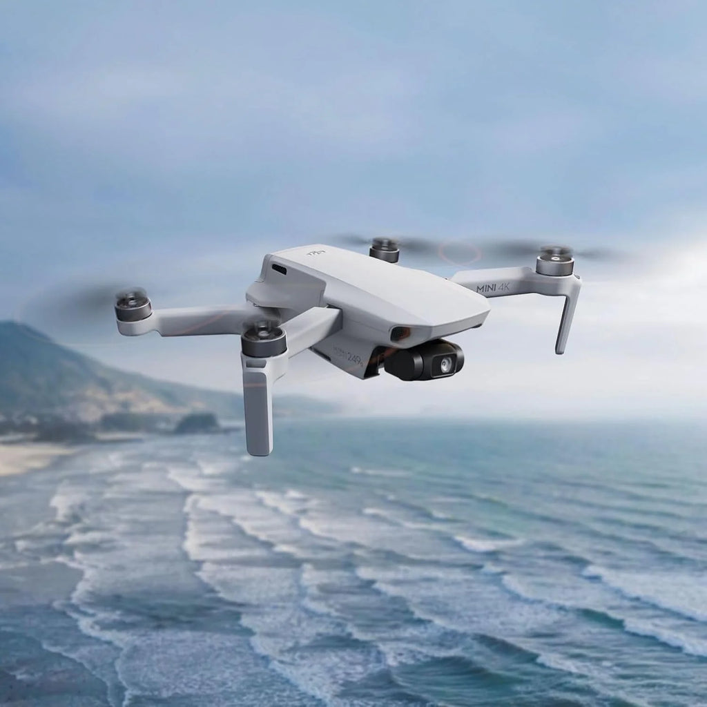 DJI Mini 4K, drone doté de caméra 4K UHD pour adultes, moins de 249 g, stabilisation sur nacelle 3 axes, transmission vidéo jusqu'à 10 km, retour automatique, résistance au vent, autonomie maximale de 31 minutes doté de une seule batterie