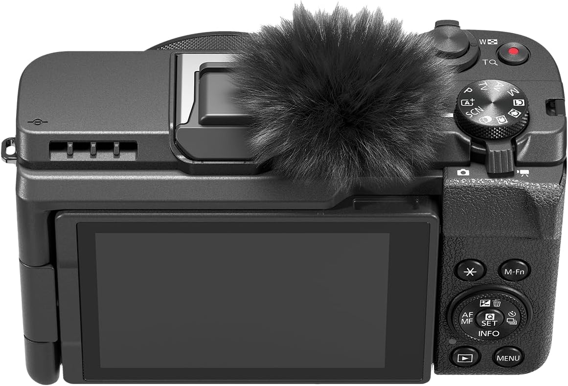 Appareil photo hybride Canon PowerShot V1 : objectif zoom ultra grand-angle intégré, vidéo 4K, vlogging, streaming en direct, création de contenu, design compact.