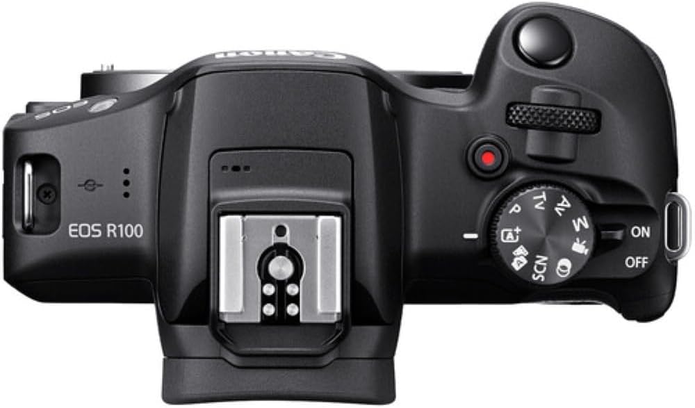 Appareil photo hybride Canon EOS R100 doté de objectif RF-S 18-45 mm F4.5-6.3 IS STM, capteur CMOS 24,1 mégapixels (APS-C), vidéo 4K, monture RF | Noir | Livré doté de carte de stockage 64 Go et sacoche (3 articles)